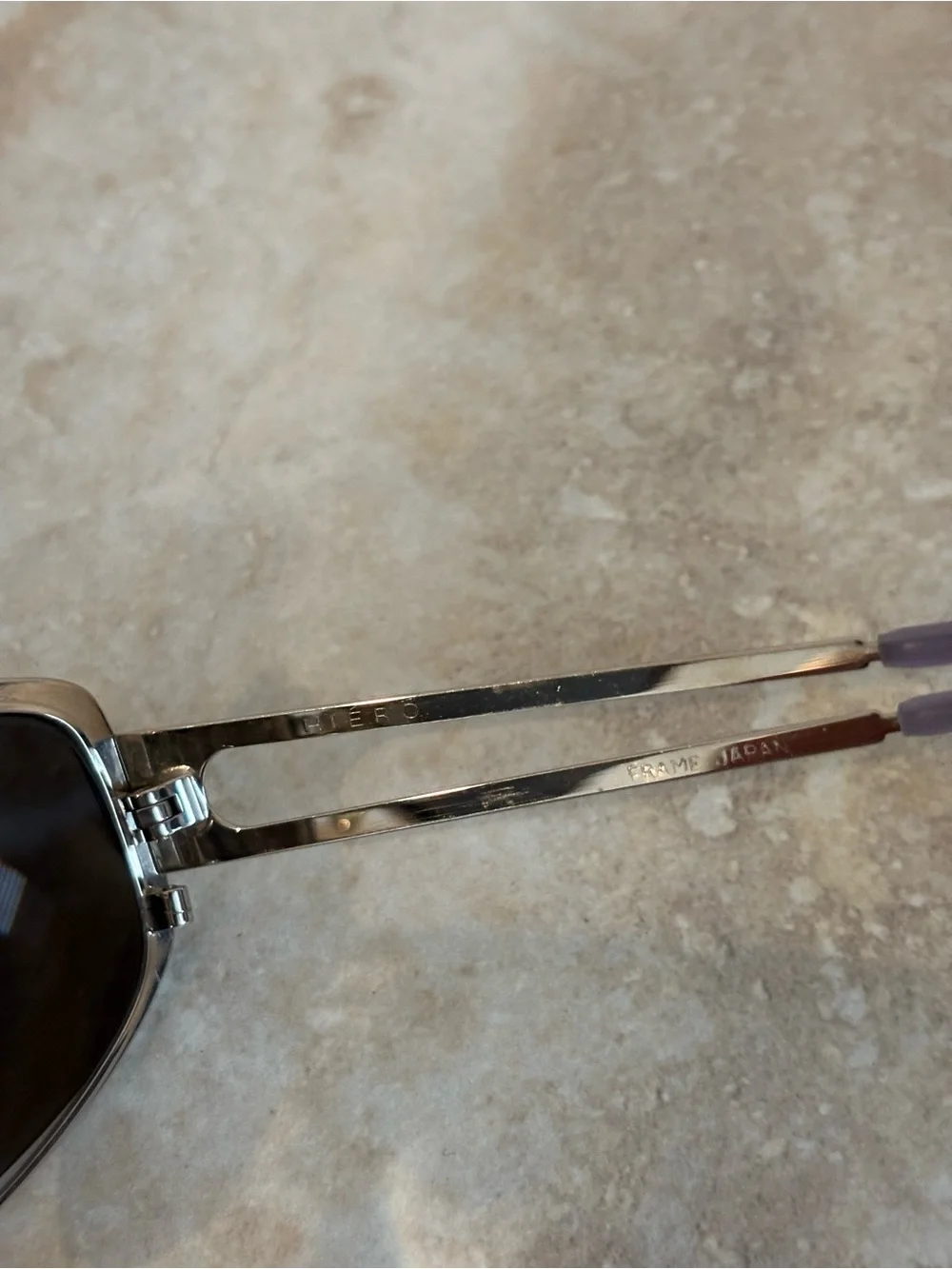 Hiero Elongated Oval Sleek Silver Frame Sunglasses with Dark Lenses